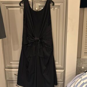 Black sleeveless Kate Spade dress with bow and front size 12